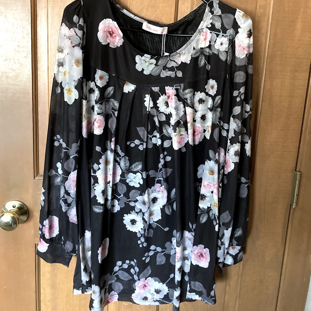Ladies never worn lined flowered tunic.